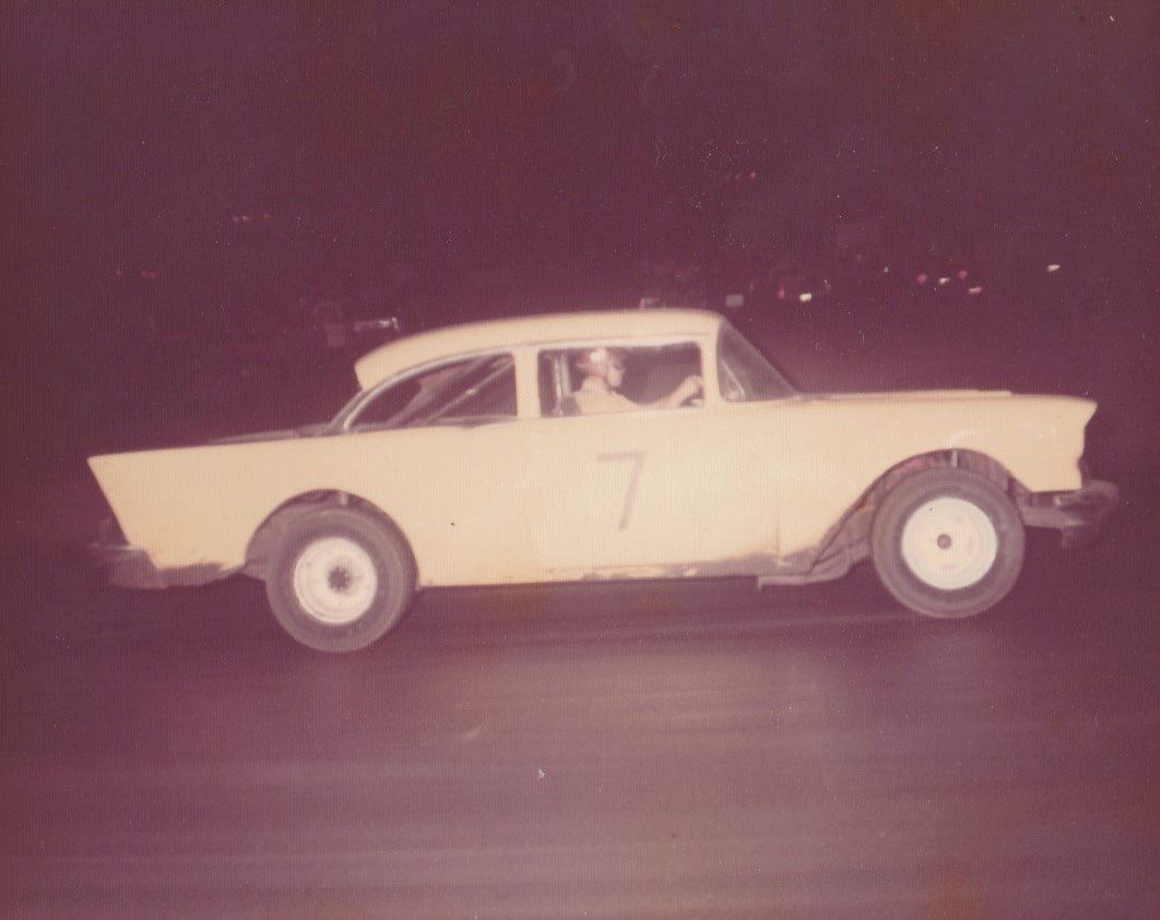 The number 71956 Chevy race car on the track