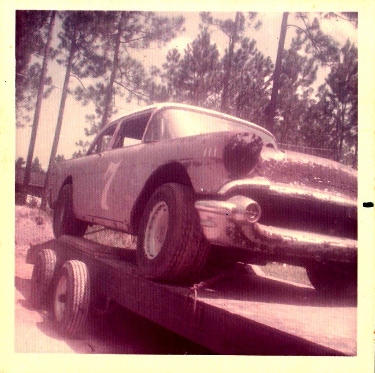 1956 Chevy racecar on an open trailer